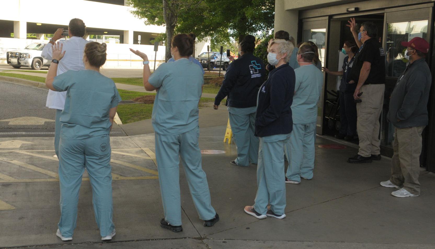 First responders give rolling salute to local health care workers